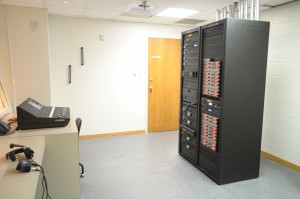 The program source equipment rack is located in the control booth directly behind the main sound console. Wireless microphone status can be monitored easily to see if a mic is muted or live, signal strength and audio level.