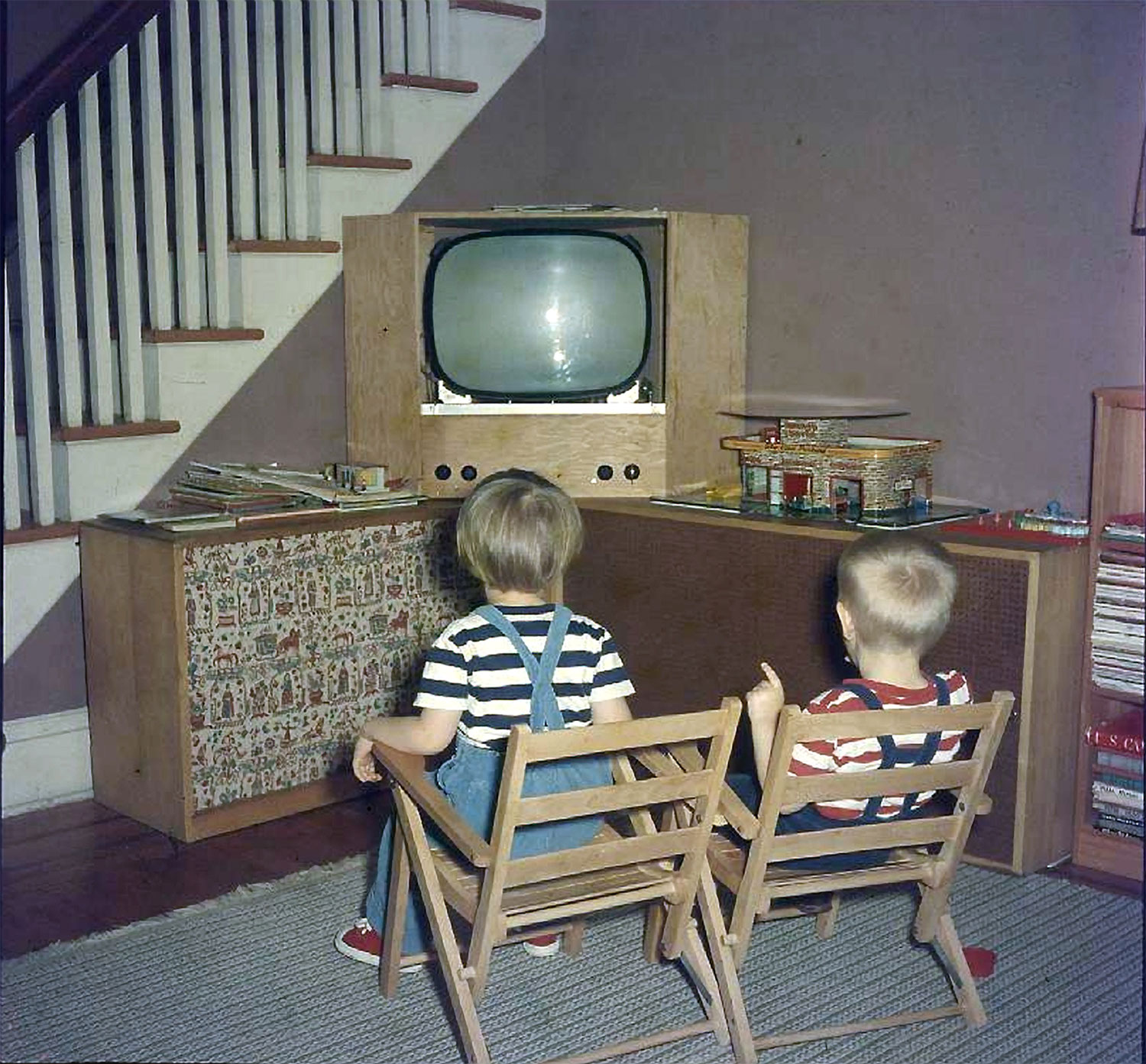 The author and his sister, Mary, watching the TV/hi-fi that their father built. Photo is circa late 1950s.