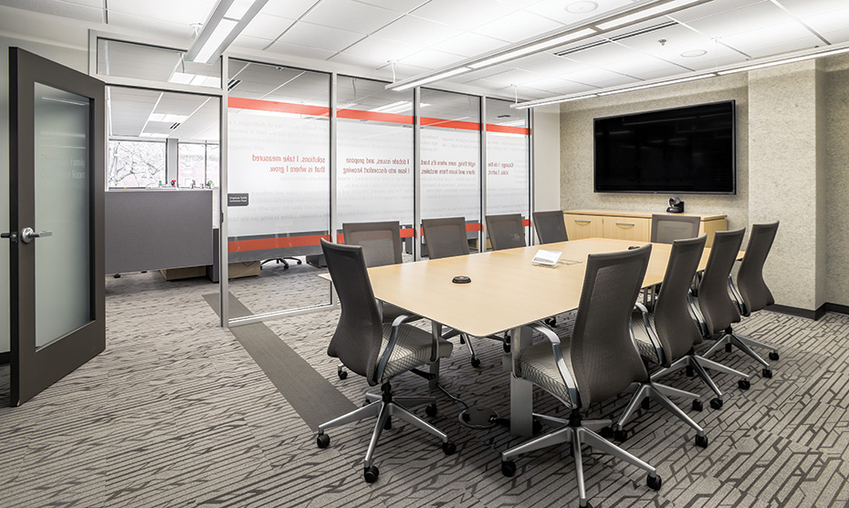 Photo courtesy Lumatic Imagery. Medium-size conference rooms feature a video camera and microphone for use with UWCI’s web-conferencing platform. A touchpanel provides control.
