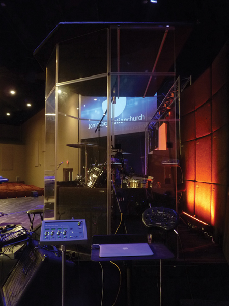 The stage houses a full band, including a drumkit with 16 microphones, for contemporary worship.