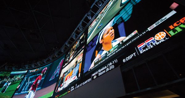 The Alumni Tower located in the main lobby of the DeNaples Student Center features five 70-inch displays. A touchpanel located at the bottom allows students to choose which information is displayed and heard through the sound system.