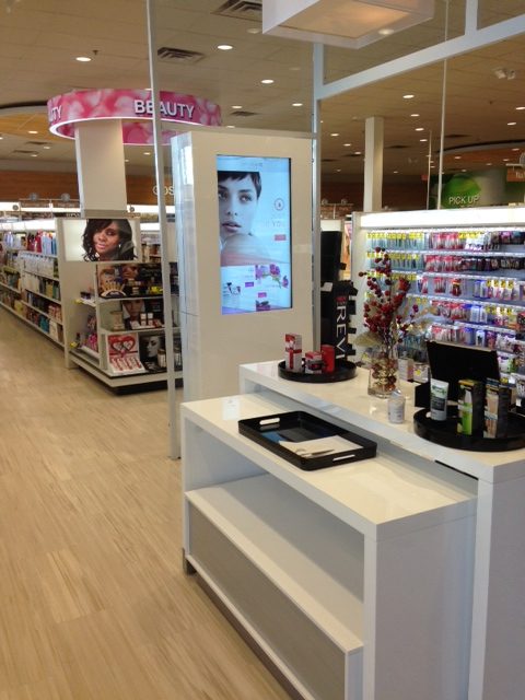 An interactive/virtual sales associate helps women shop by skin condition; and then find their selection at shelf.