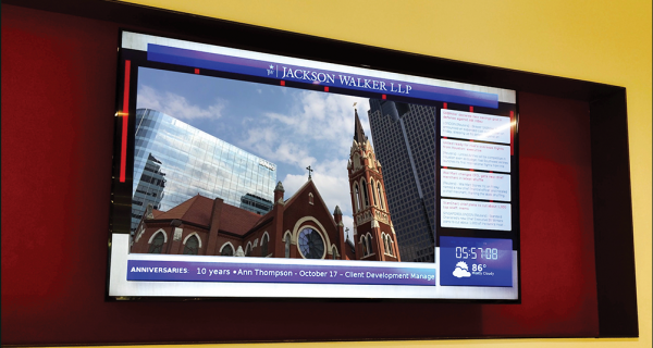 Jackson Walker’s digital signage content features custom widgets and video produced by Facility Solutions Group.