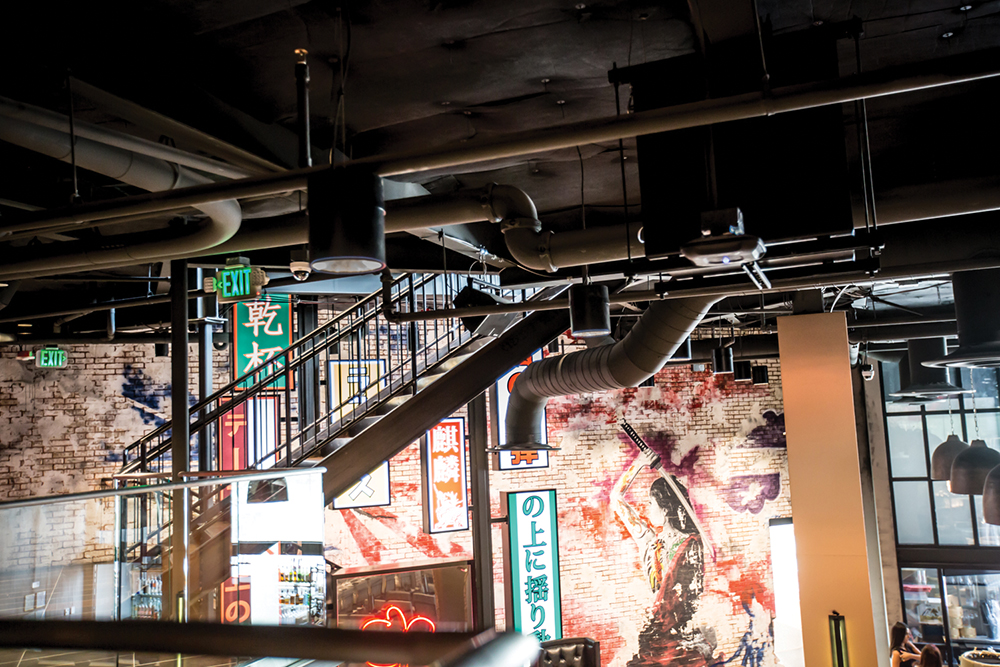 Speakers are mounted off the ceiling on a flying cradle.