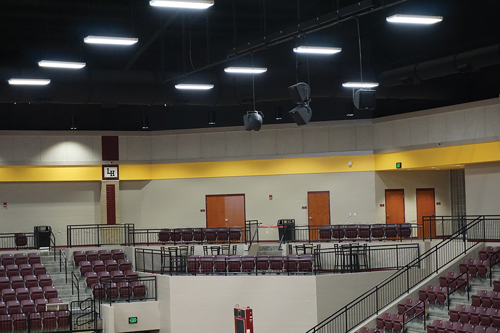 It took some coordination to get the PA speakers hung at the correct angles and elevations that minimize interference with the lighting but are still be above the throwing arc of a basketball in play.