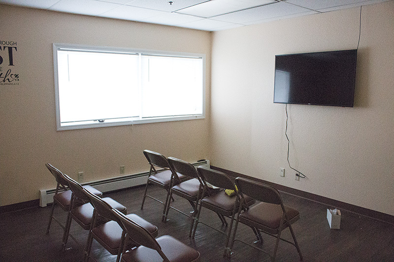 The video feed from the main sanctuary is shown on owner-provided flatscreen displays in the building’s two small overflow spaces.
