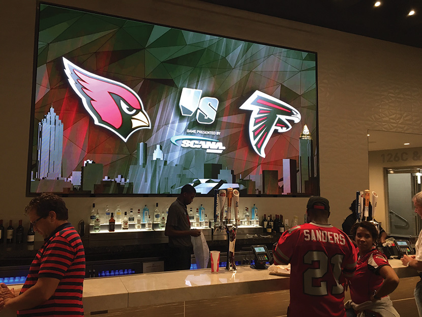 This is the first pro-sports stadium in which the entire video system is IP from the core. Input from the cameras and the graphics are all IP, going out to IP displays, including this stunning one above one of the bars.