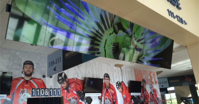 A banner videowall deployment at the Silverstein Arena in Kansas City MO greets attendees with stunning visuals in 4K upon entering the arena.