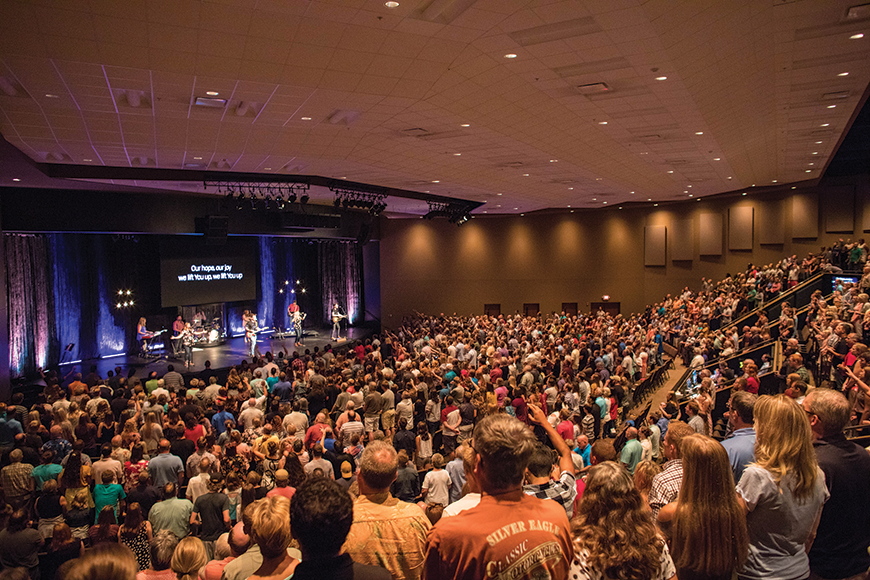 Candeo Church’s new venue has plenty of room for its growing congregation. All of the seating in the theater-like sanctuary is oriented toward center stage.