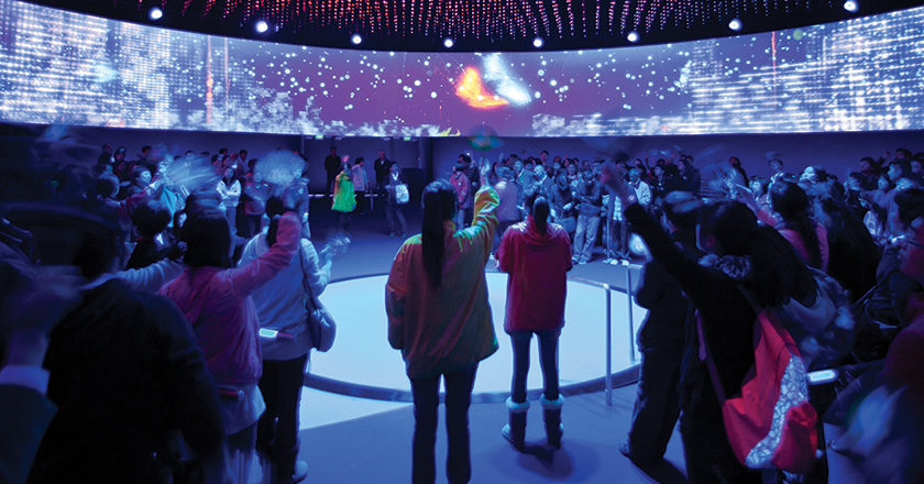 Visitors wave in unison, activating the LED façade and becoming experientially linked to the building, inside the Dream Cube.