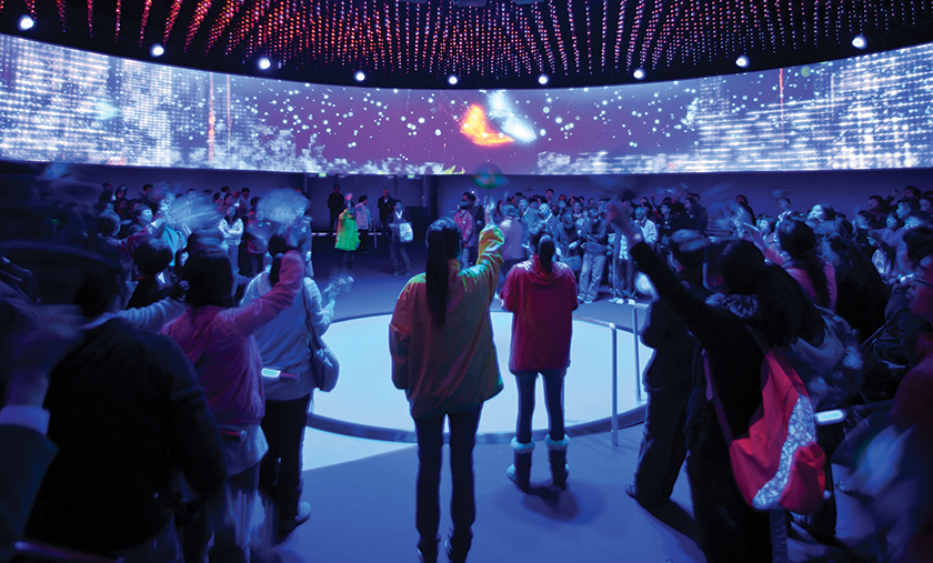 Visitors wave in unison, activating the LED façade and becoming experientially linked to the building, inside the Dream Cube.