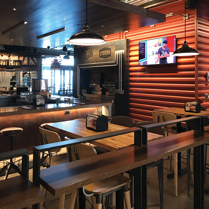 The first-floor bar is equipped with pendant speakers, a subwoofer and a 4K display for music, TV programs and digital signage.