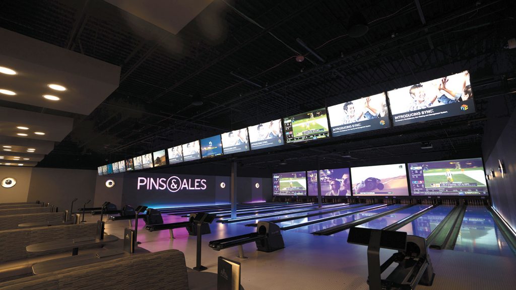 Projection screens behind the lanes and LED TVs above mean bowlers won’t miss a second of the action, whether they’re watching music videos or March Madness.