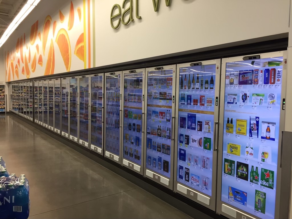 supermarket with digital refrigerator displays